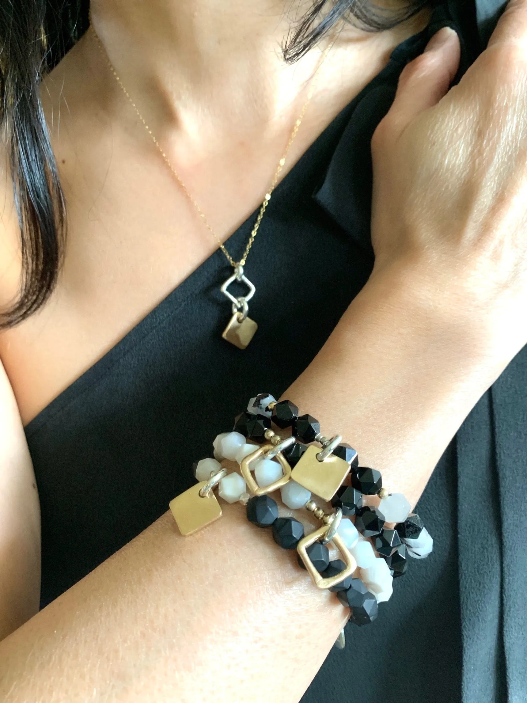 Contour Collection:  Black Onyx Starcut Stretch Bracelet with Bronze Square Link