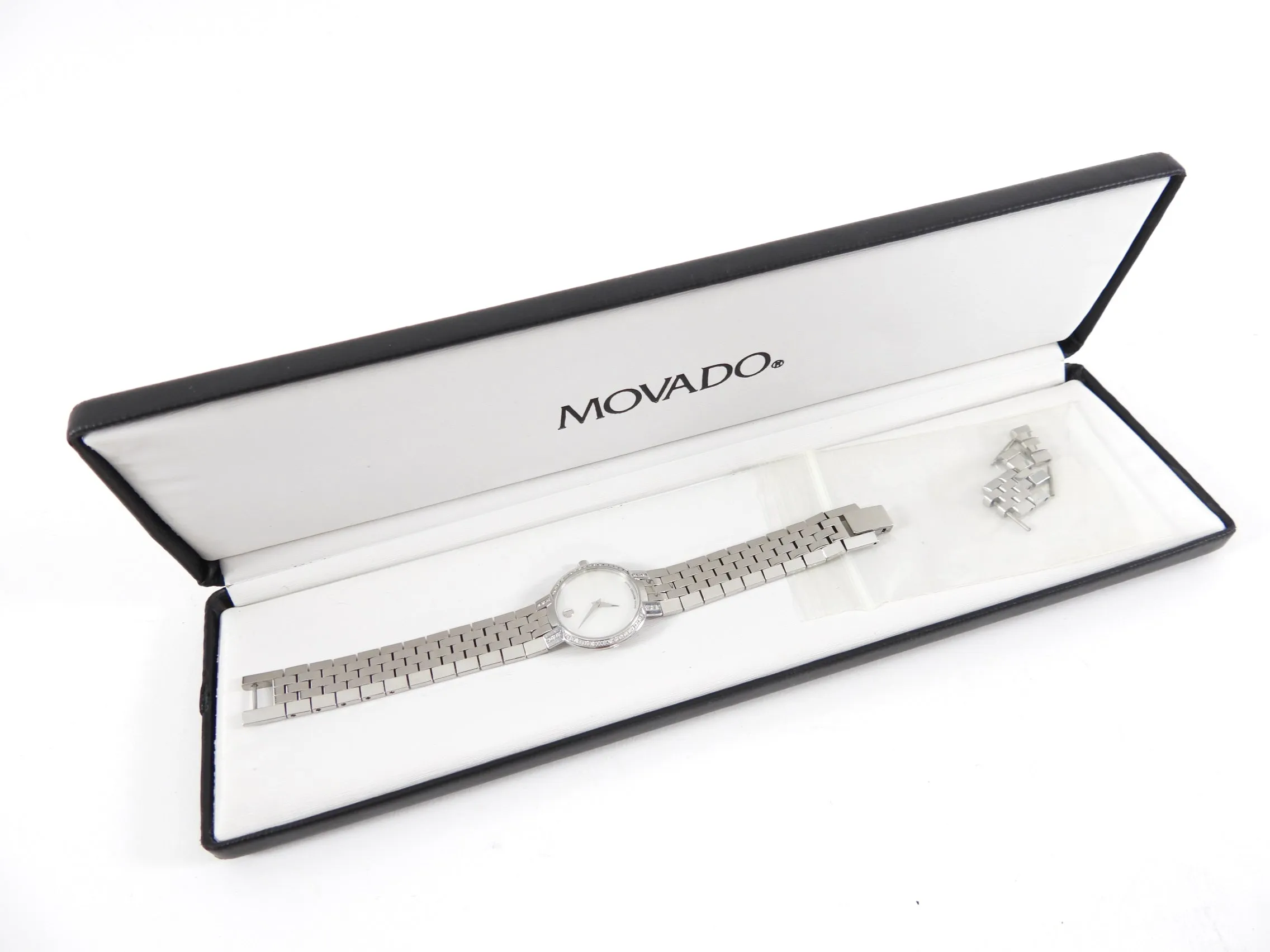 Movado Ladies Faceto Watch with Diamond Bezel